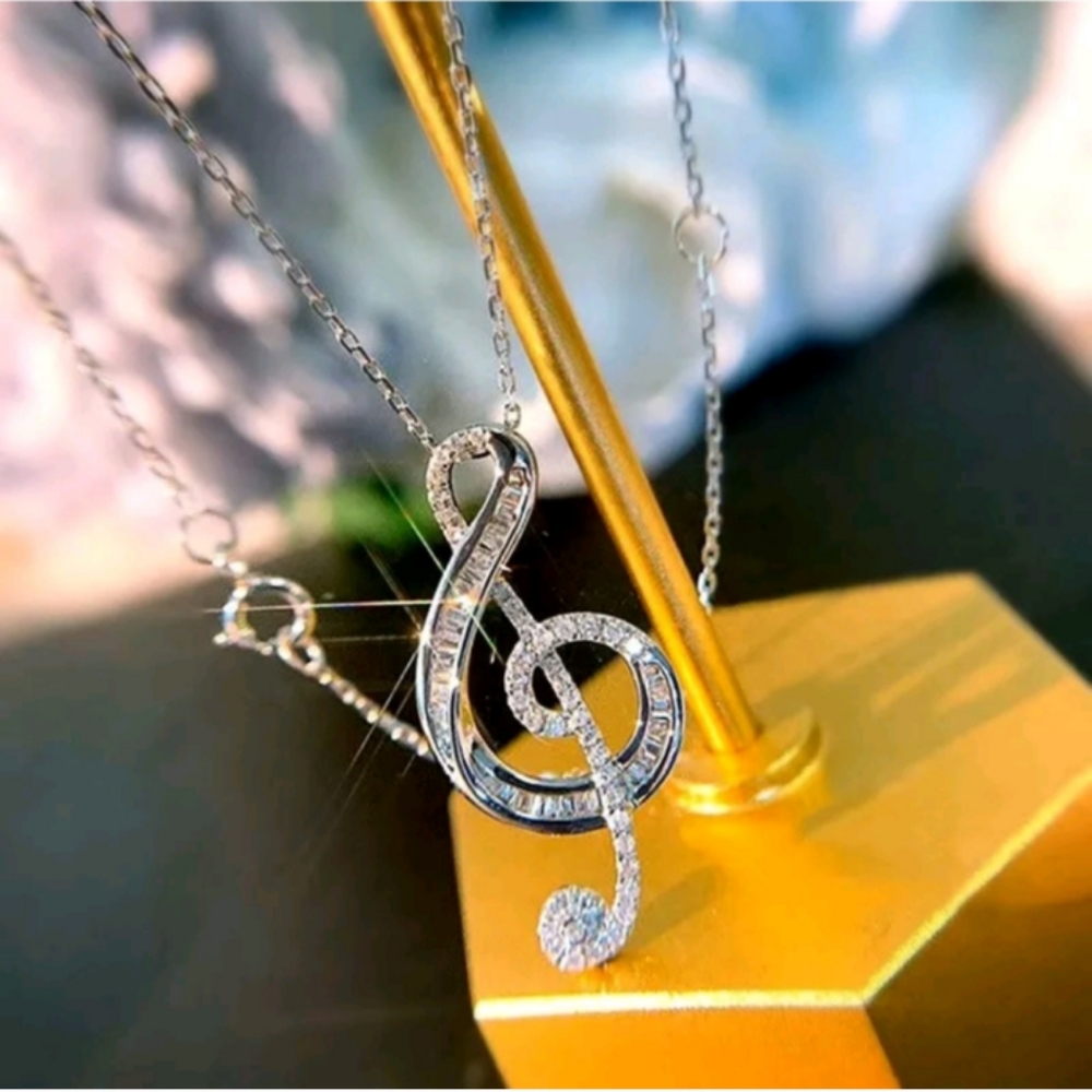 New silver cz musical note necklace